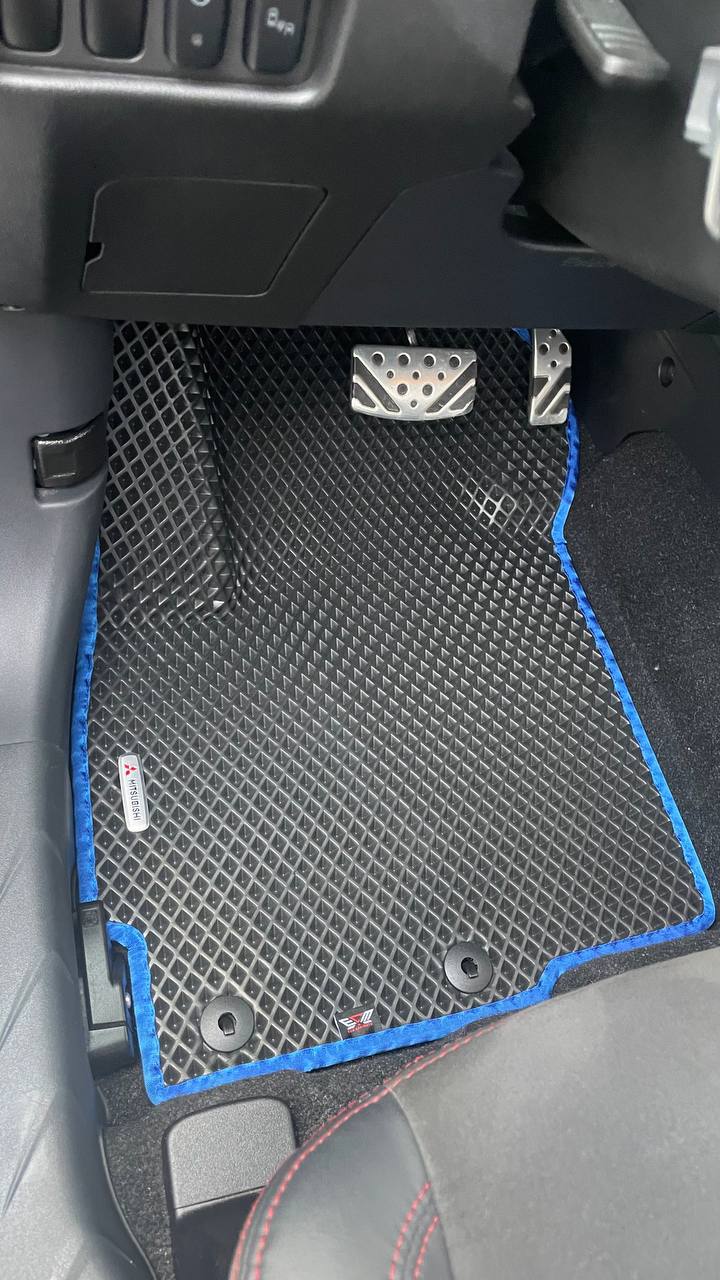 Custom EVA car mats installed in Mitsubishi RVR 2010-2024 interior black with blue trim