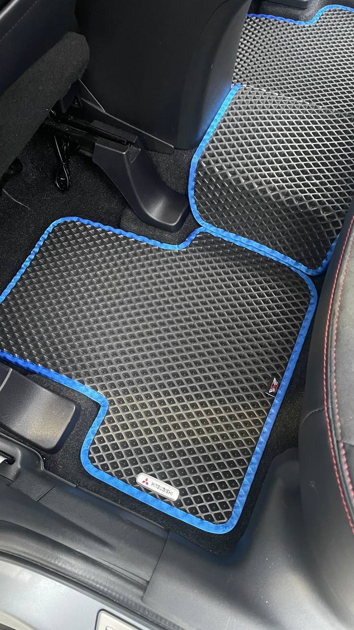 Real interior Mitsubishi RVR with custom EVA car mats black blue trim