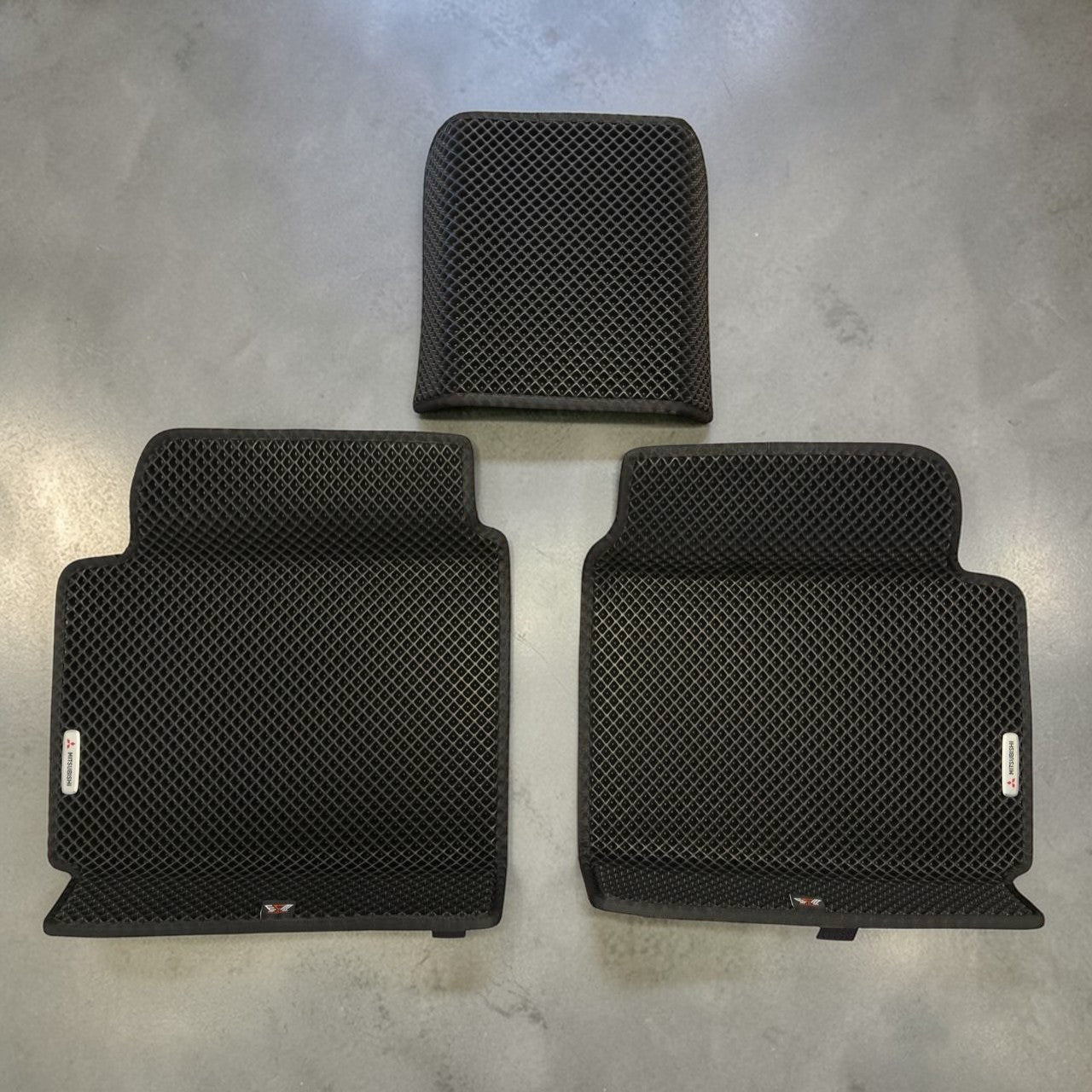 Rear EVA car mats Mitsubishi Outlander PHEV 2022-2025 black on black with center bridge