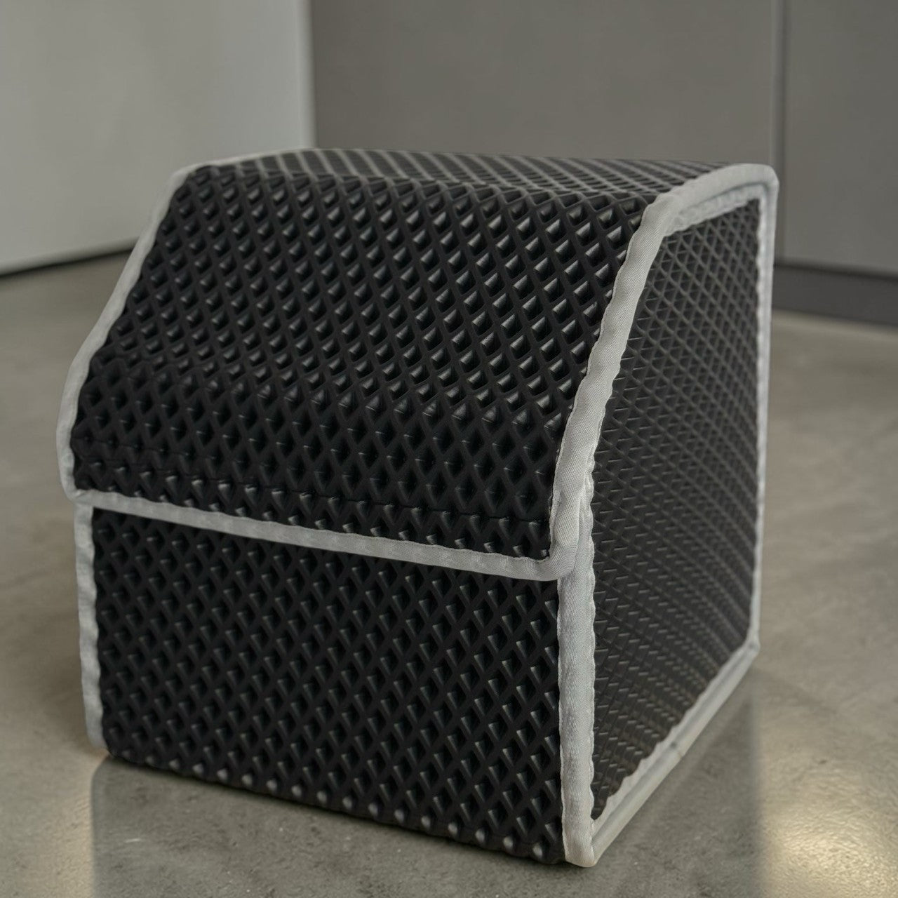 Compact small EVA car trunk organizer designed to keep your vehicle tidy. Lightweight, waterproof, and foldable storage box perfect for small tools, car accessories, and everyday essentials.